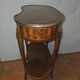 Kidney-shaped side table in Louis XVI style with marquetry.