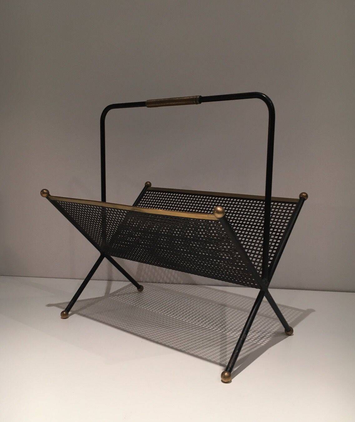 Black lacquered metal design magazine rack, perforated sheet and brass