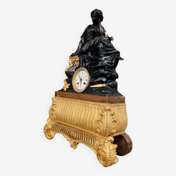 Empire / Restoration period clock in gilded and patinated bronze 19th century