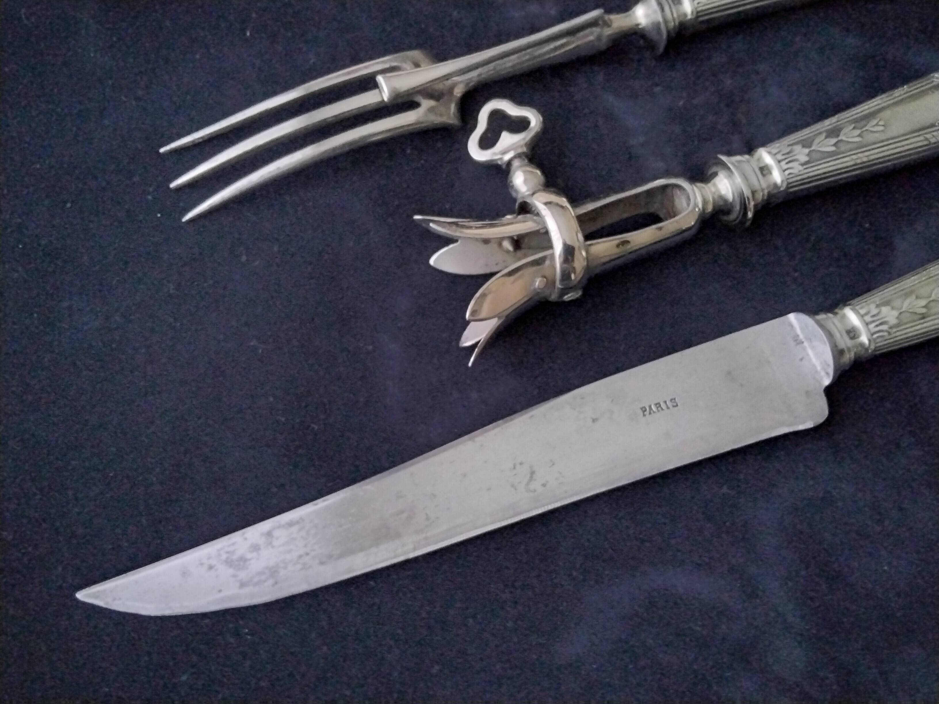 Old cutting service in steel and silver metal in its box