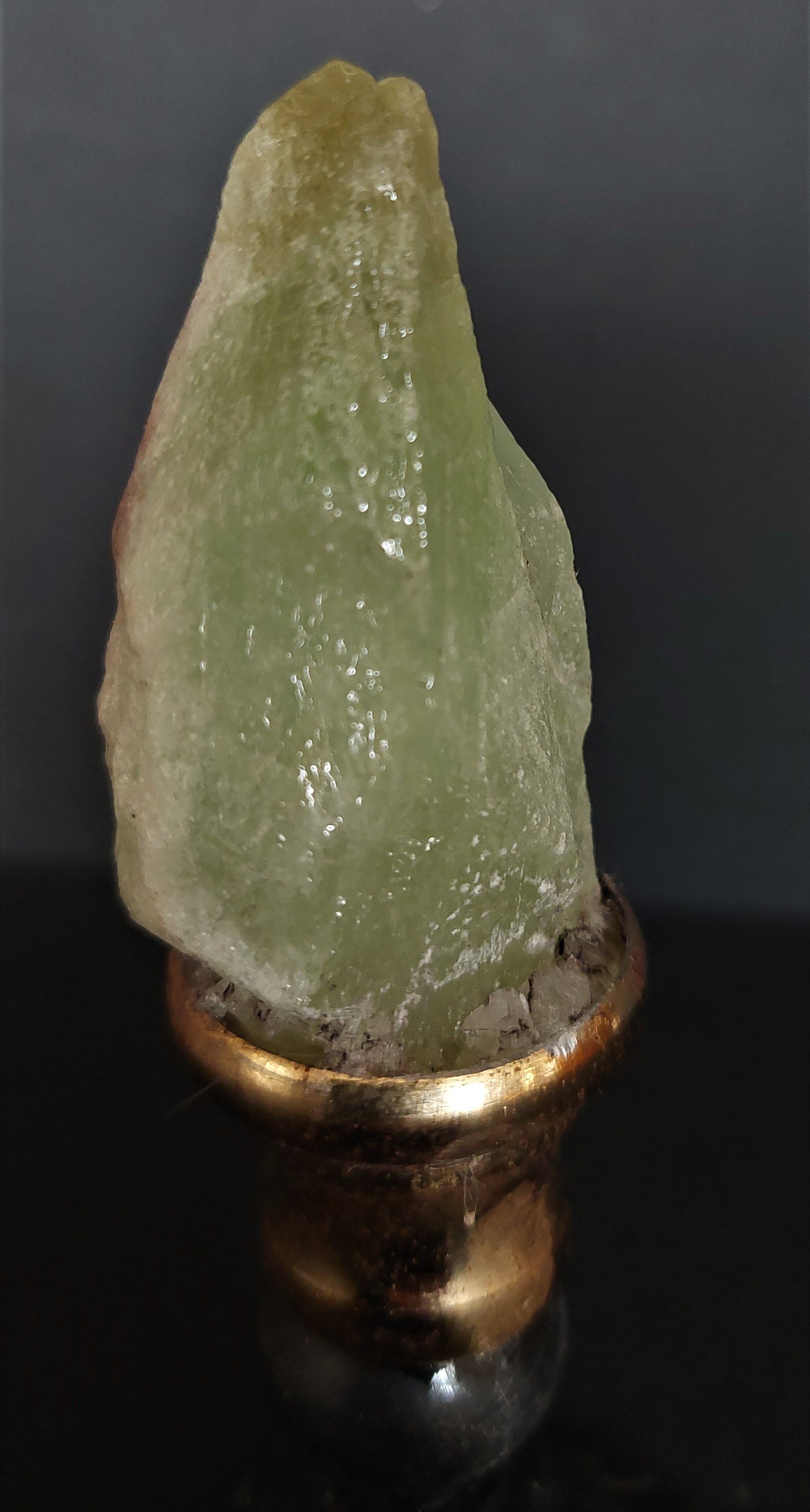 Cabinet of Curiosities green calcite on pedestal