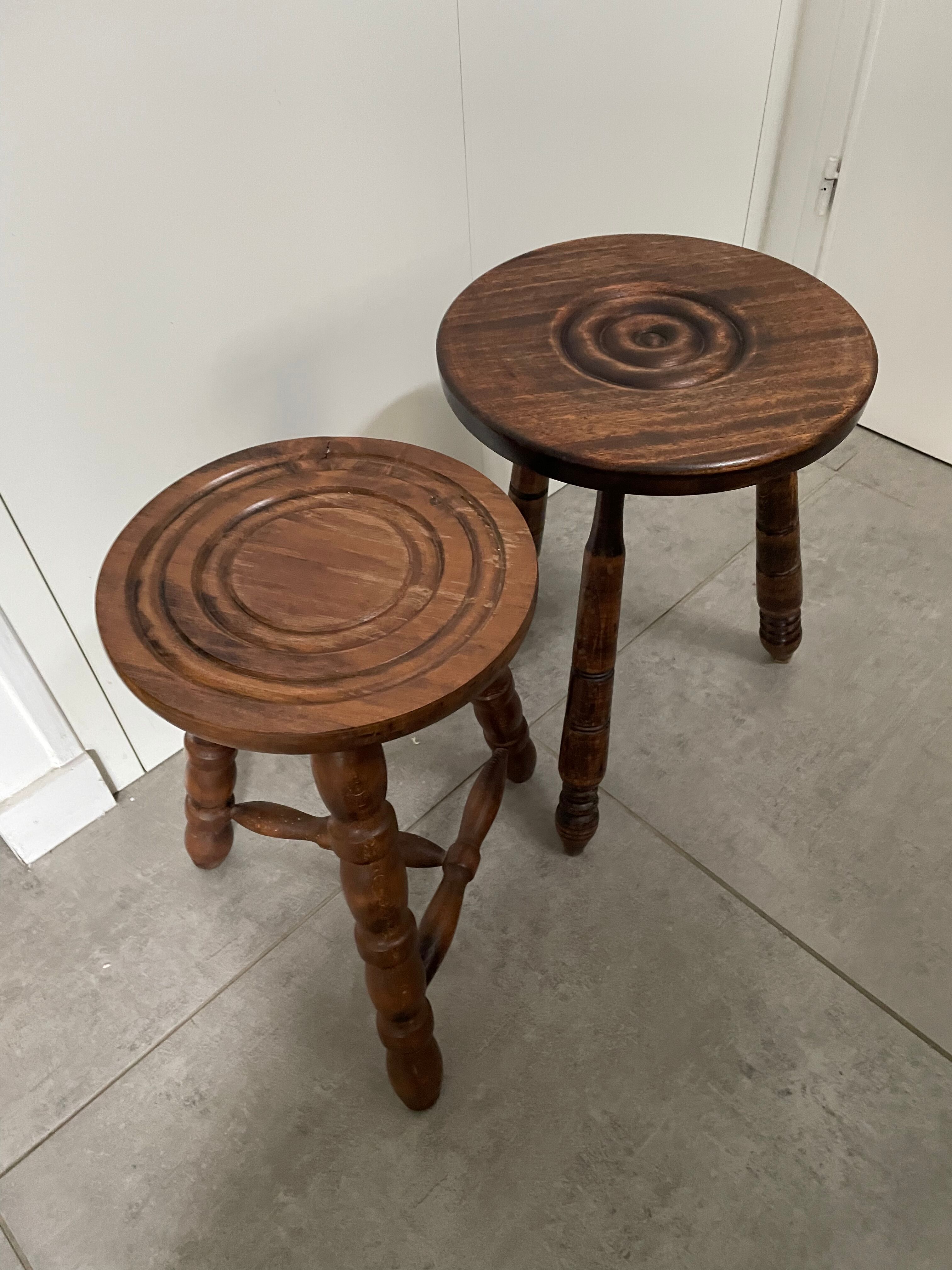 Set of two tripod stools in turned wood