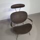 Fauteuil conçu par Yuzuru Yamakawa Structure en métal. Assise et dossier en rotin tressé.