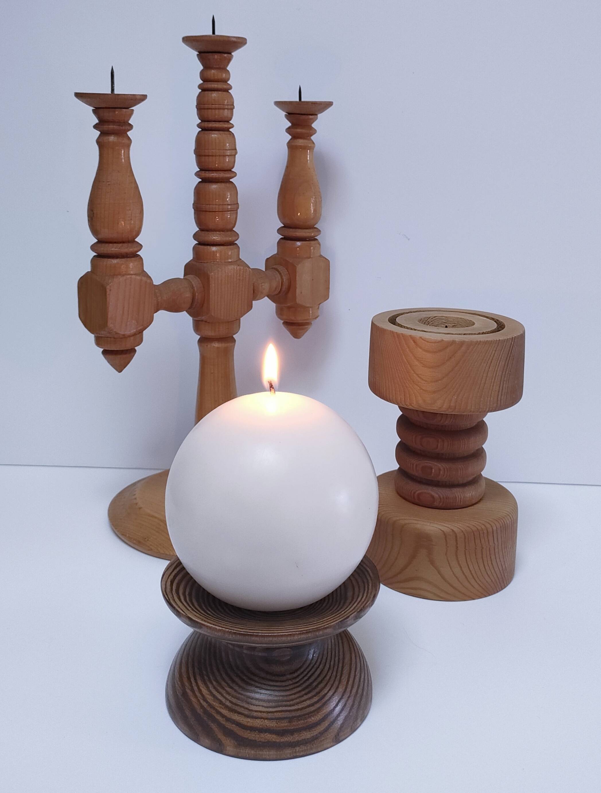 Three Scandinavian wooden candle holders, vintage design