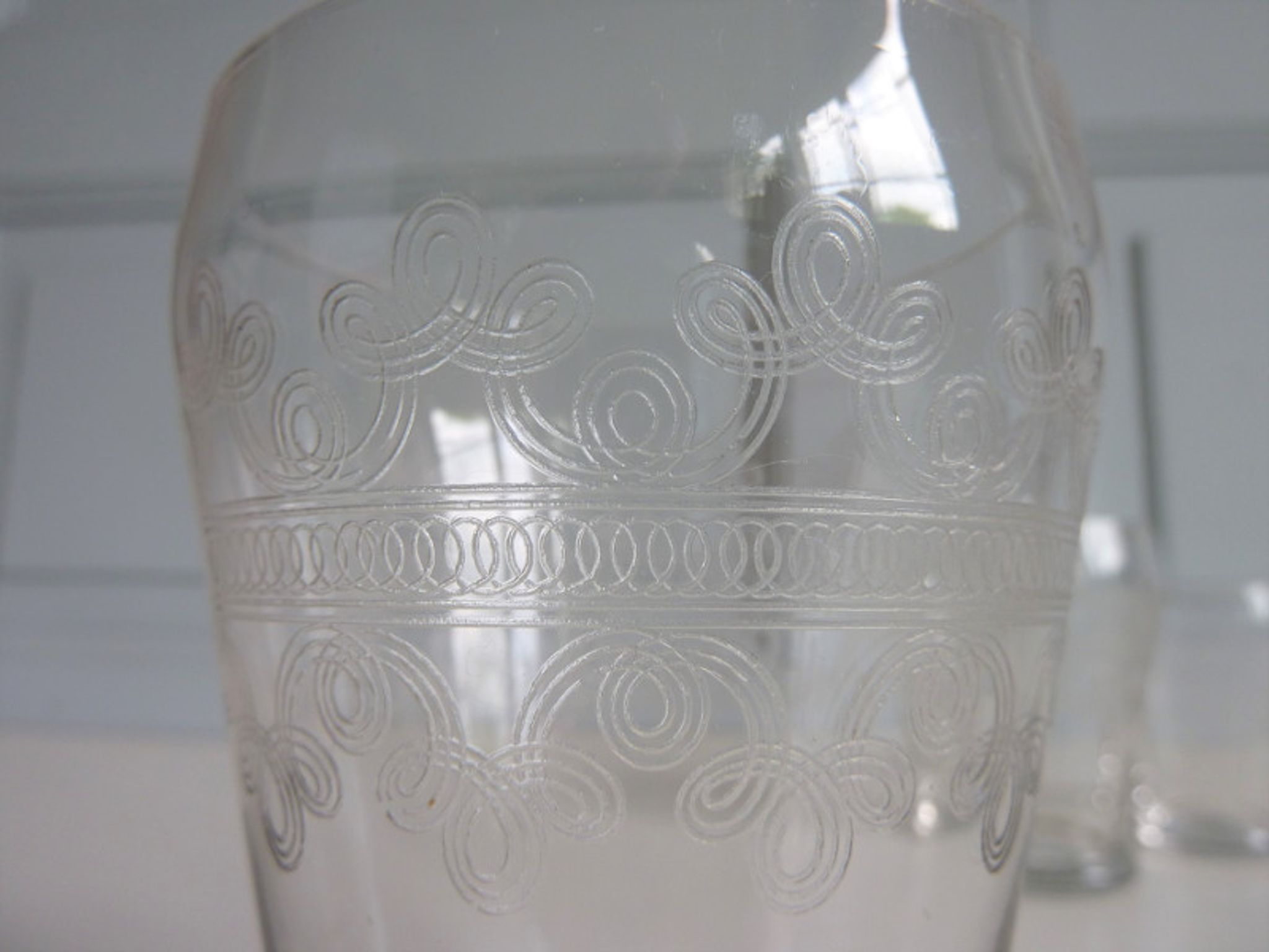 32 antique glasses engraved with Friezes of Arabic and spirals