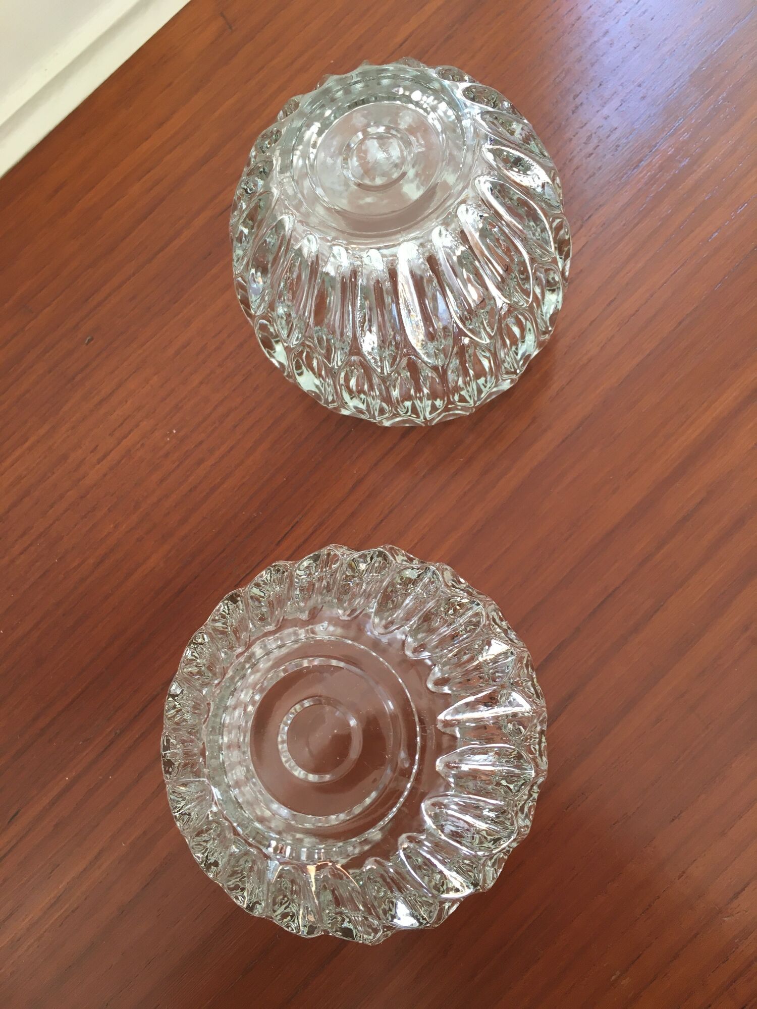 Duo of chiseled glass photophores