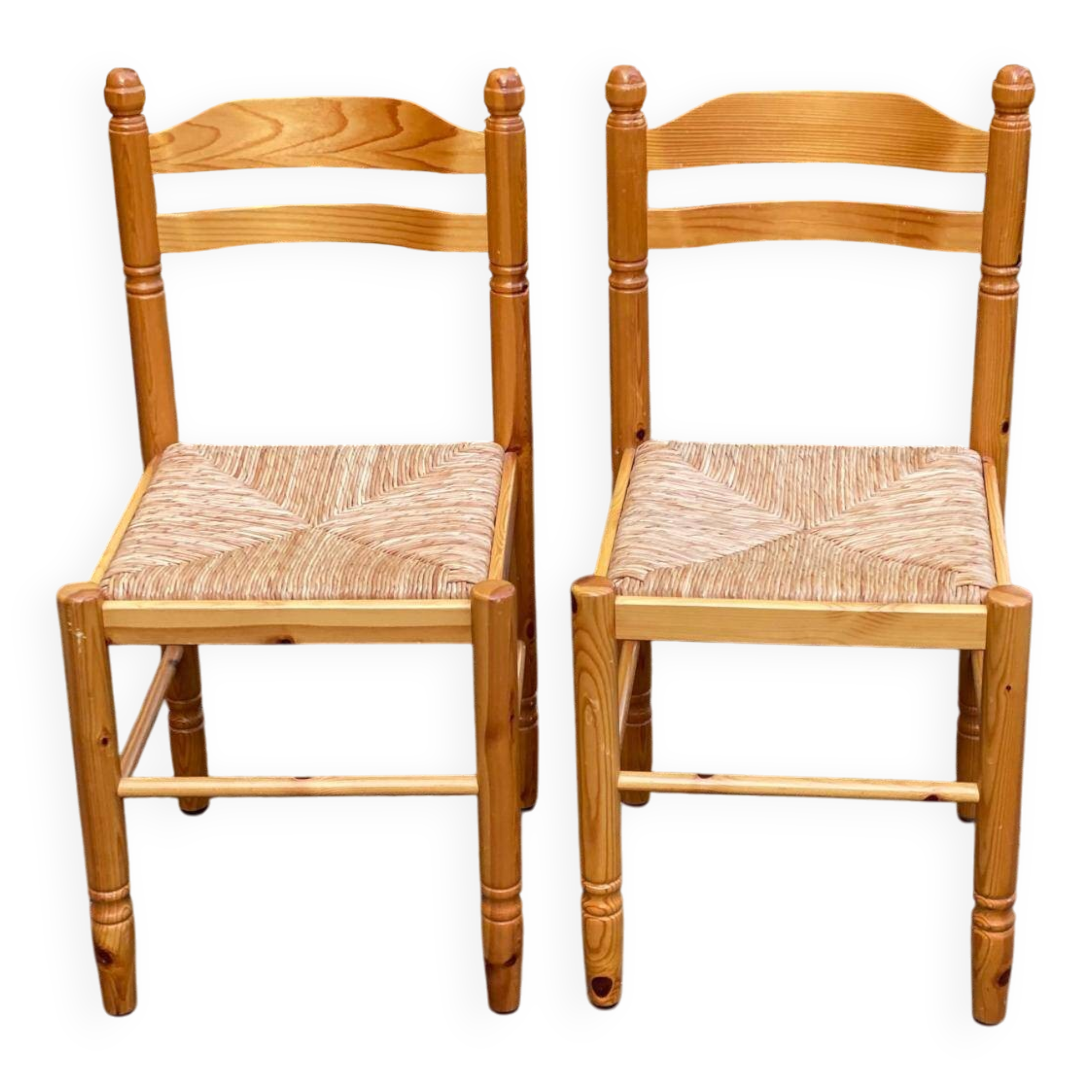 2 straw-seated chairs in light-colored solid wood