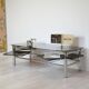 Chrome metal coffee table with smoked glass top.