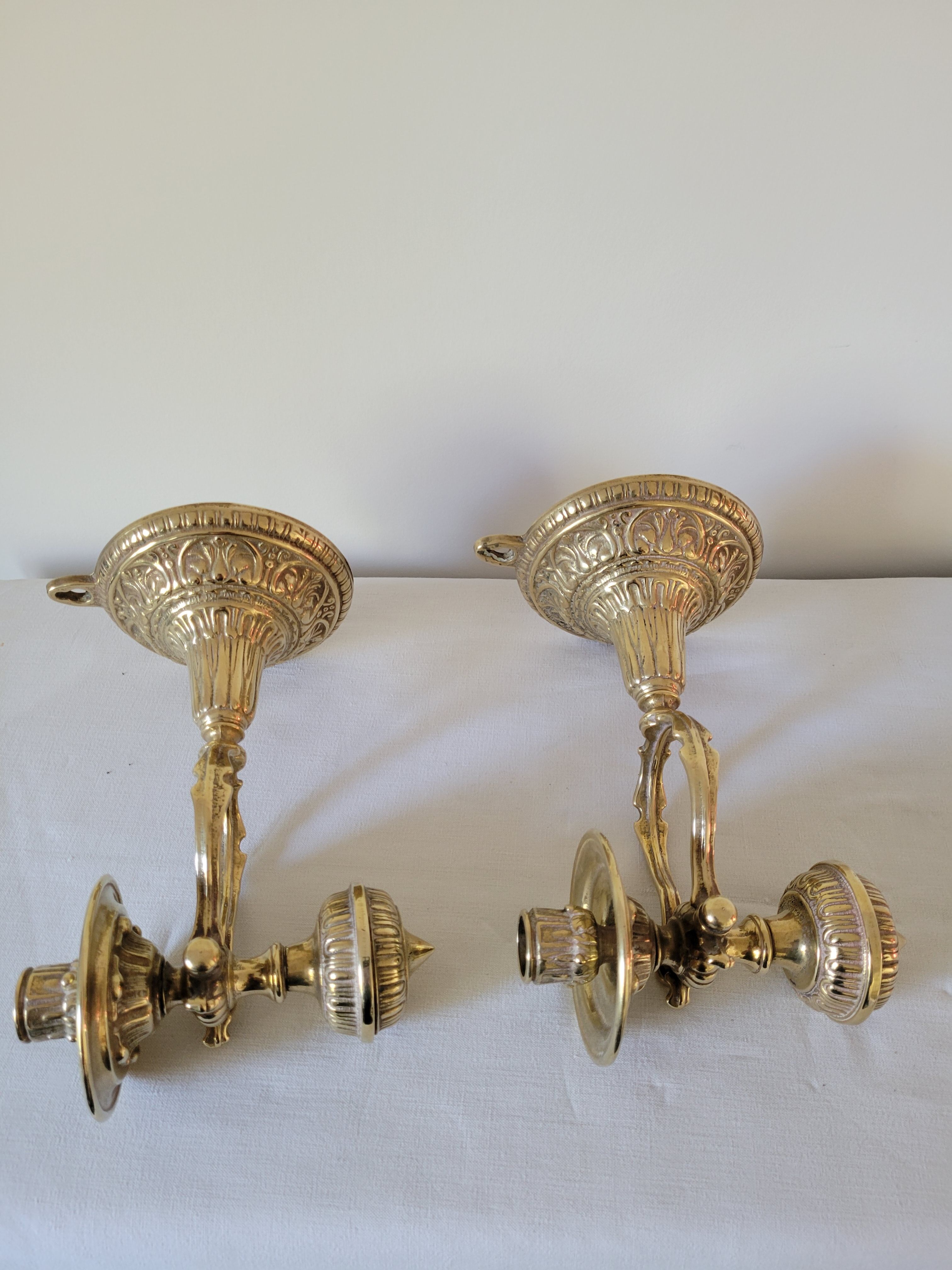 Duo of brass balance wall candle holders