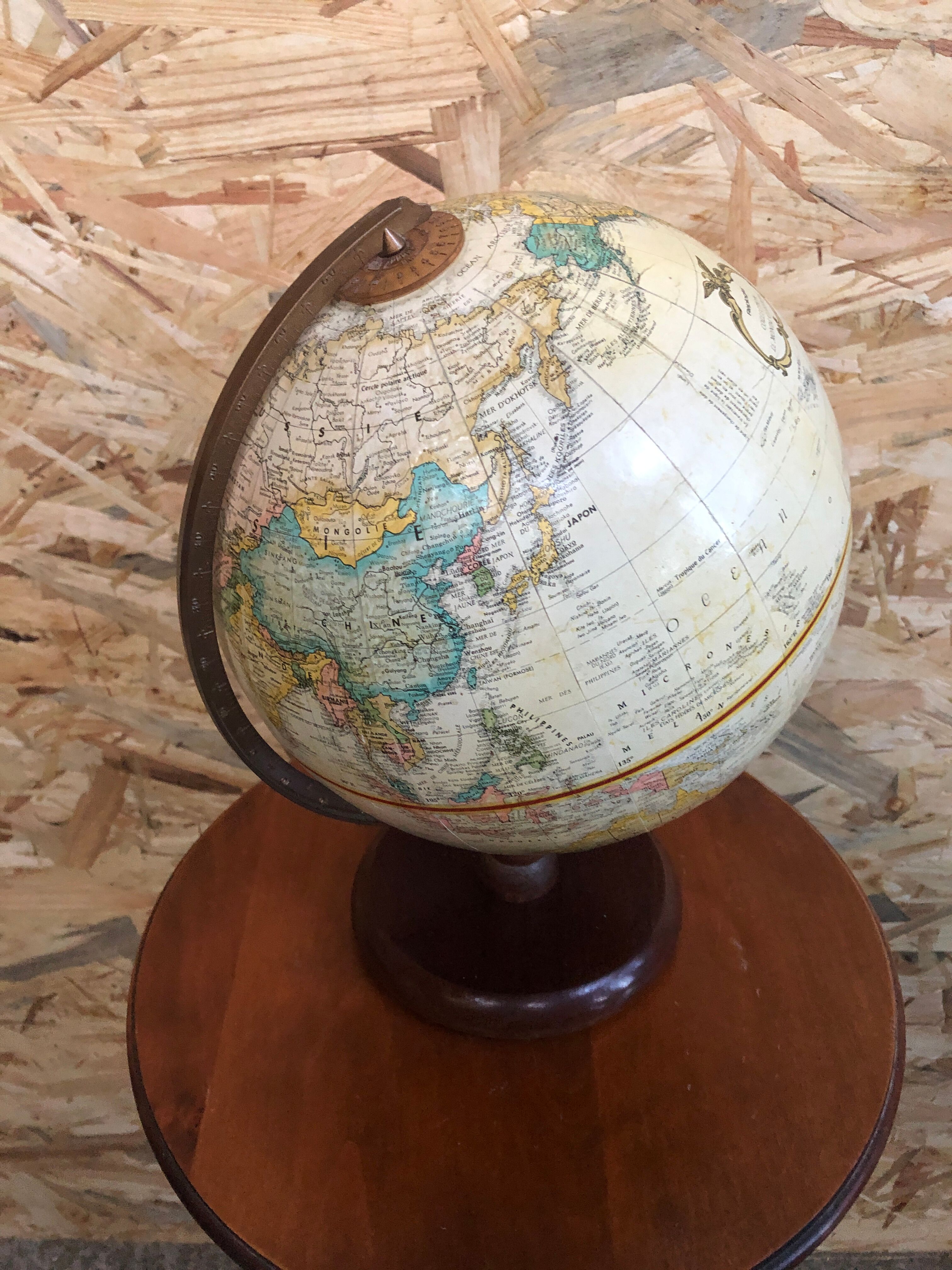 Old globe world map with arch + vintage wood base