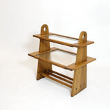 Served in oak and glass from the 50s and 60s.