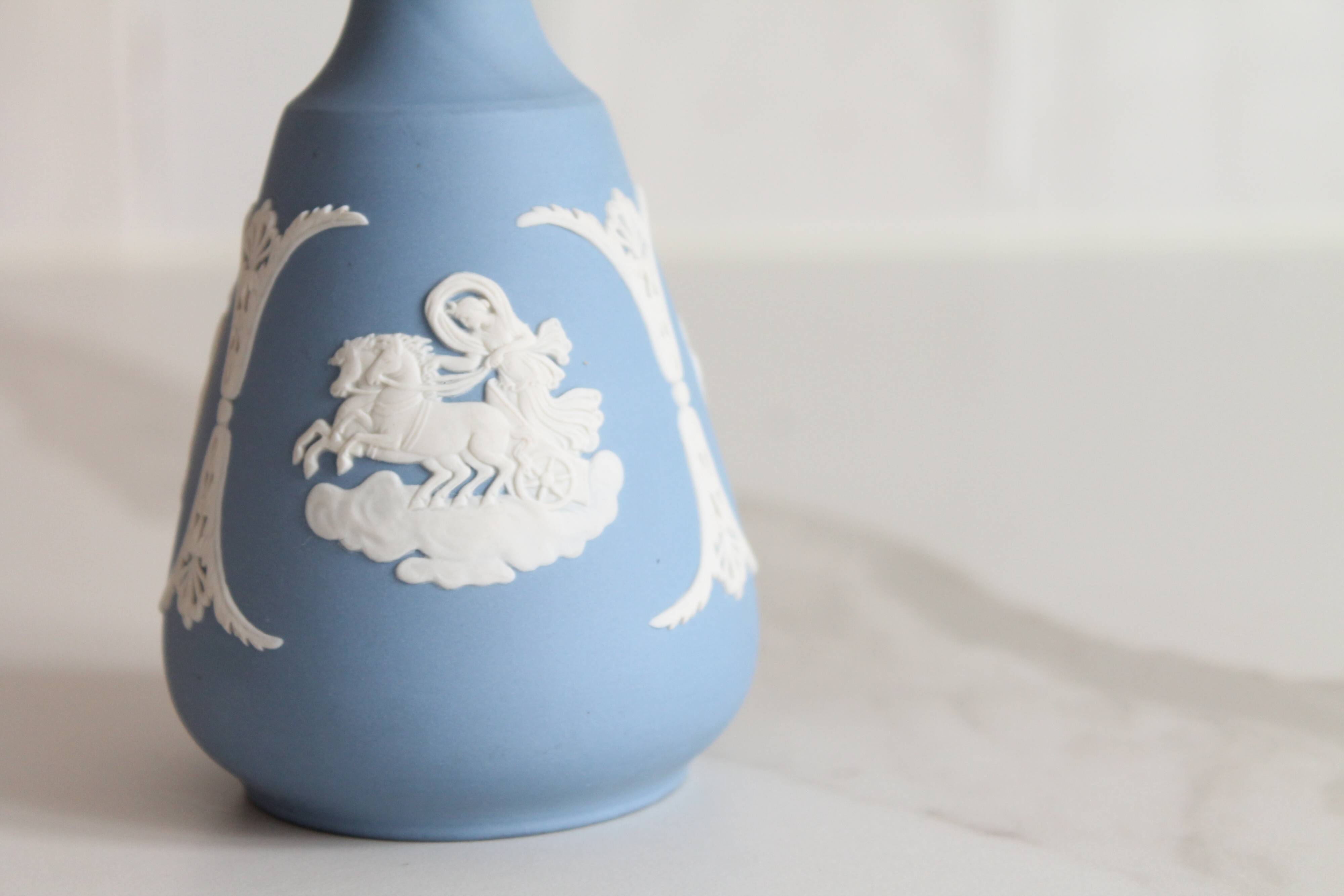 Blue porcelain vase by Wedgwood.