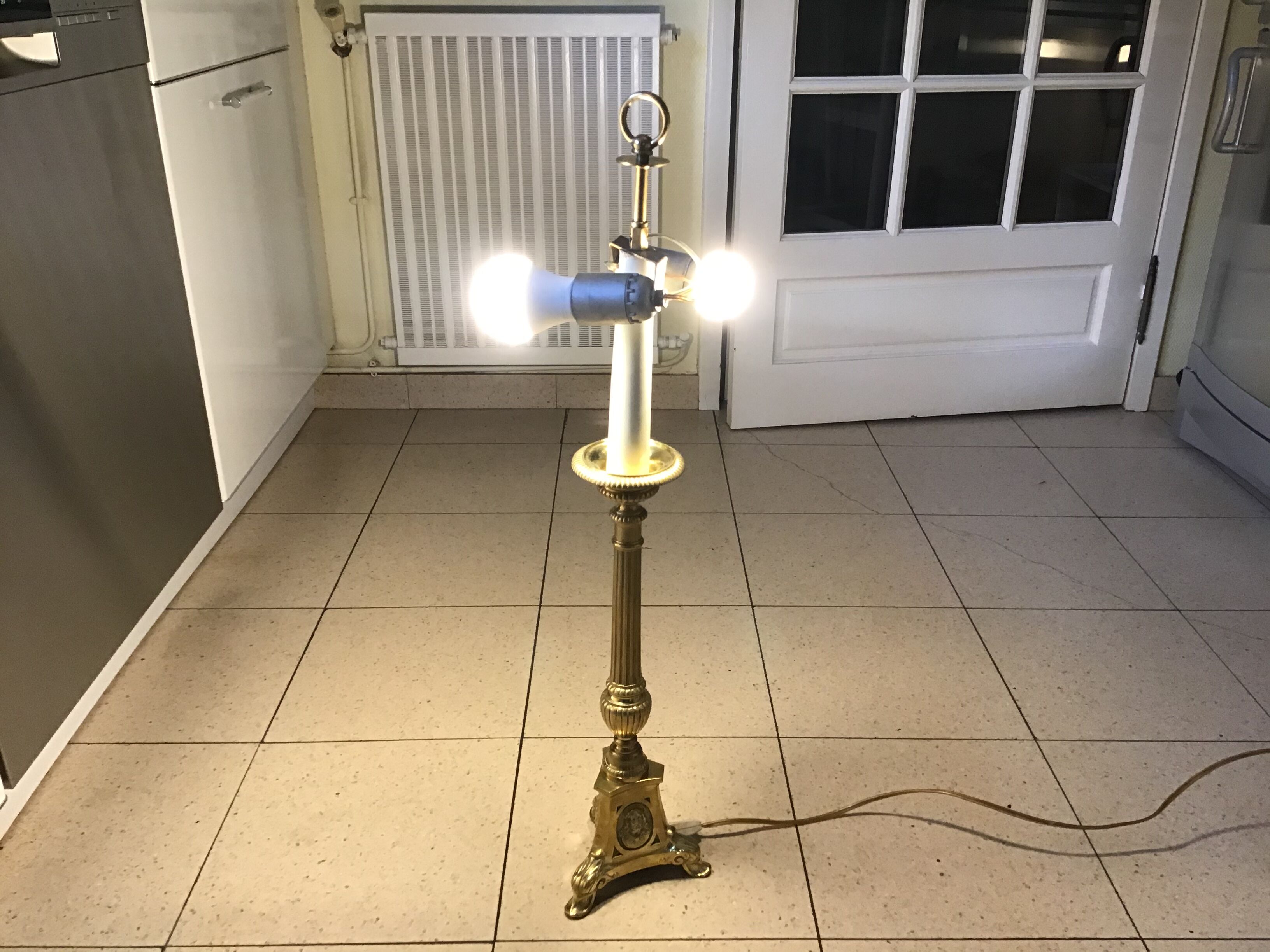 Candle spike mounted in lamp