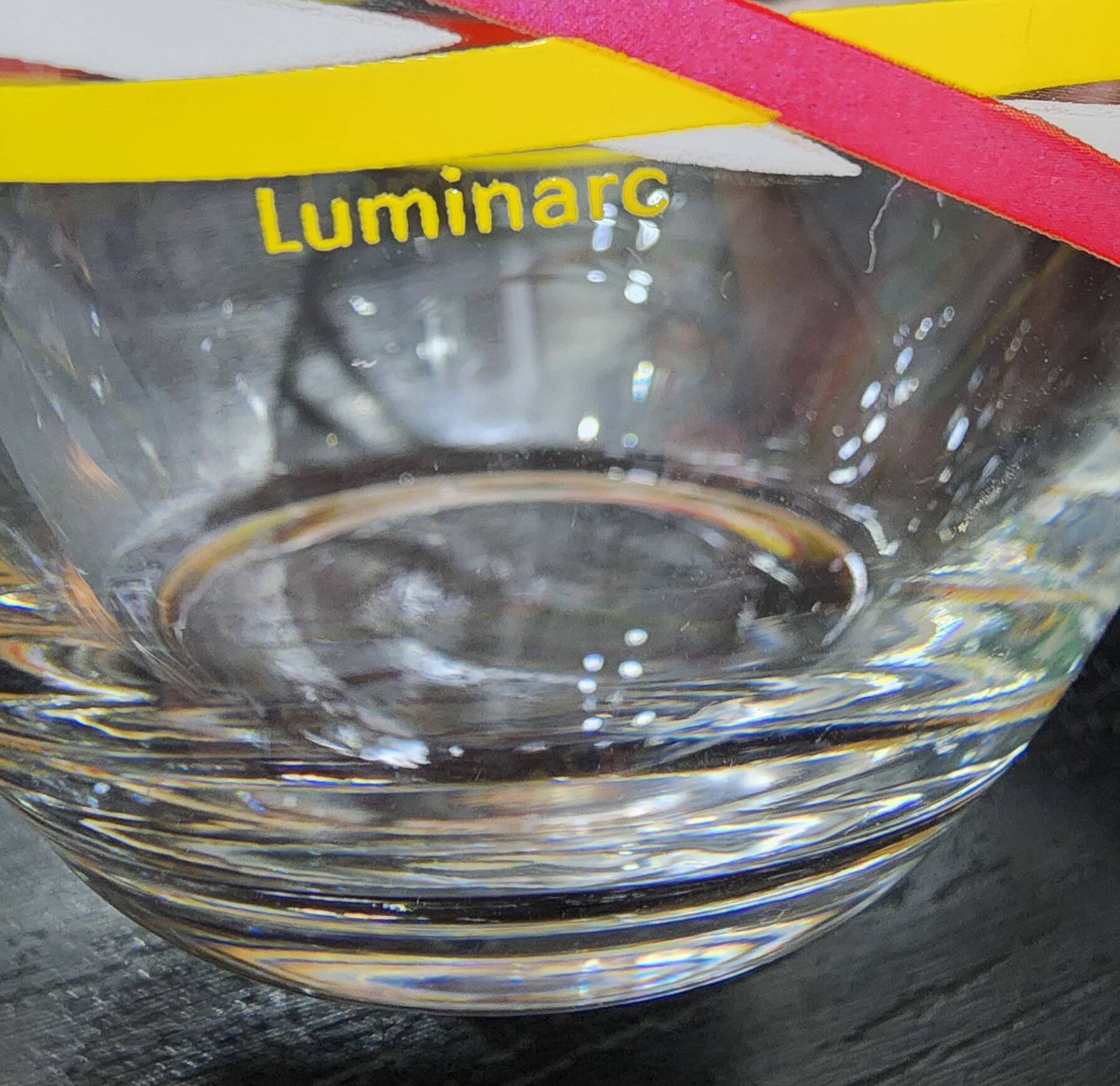 4 vintage Luminarc water glasses with coloured spiral line patterns.