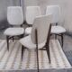 Set of 4 white and wooden Scandinavian chairs.