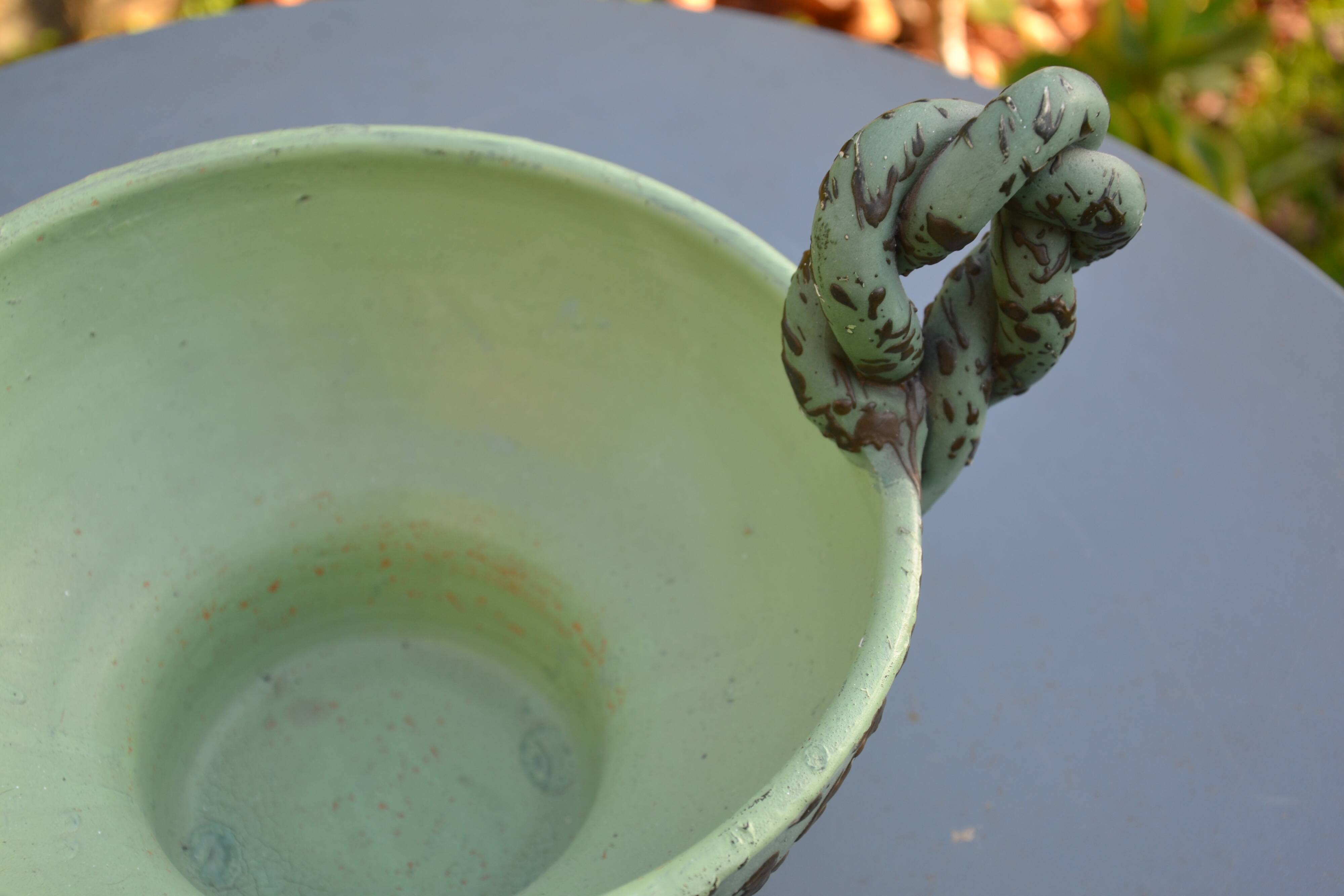 Antique cup with handles