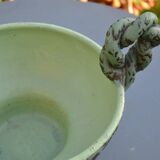 Antique cup with handles