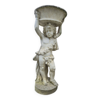 Jardinière ancienne en pierre reconstituée figurant un chérubin