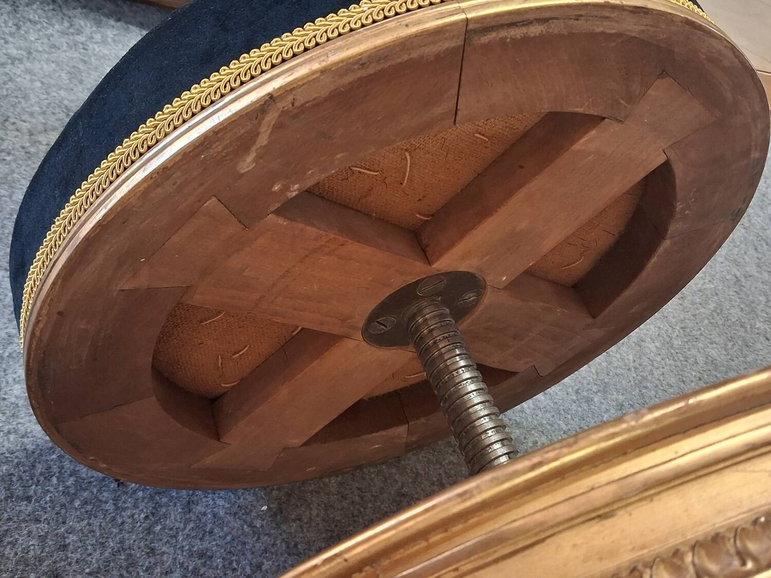 Golden wooden piano stool