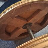 Golden wooden piano stool