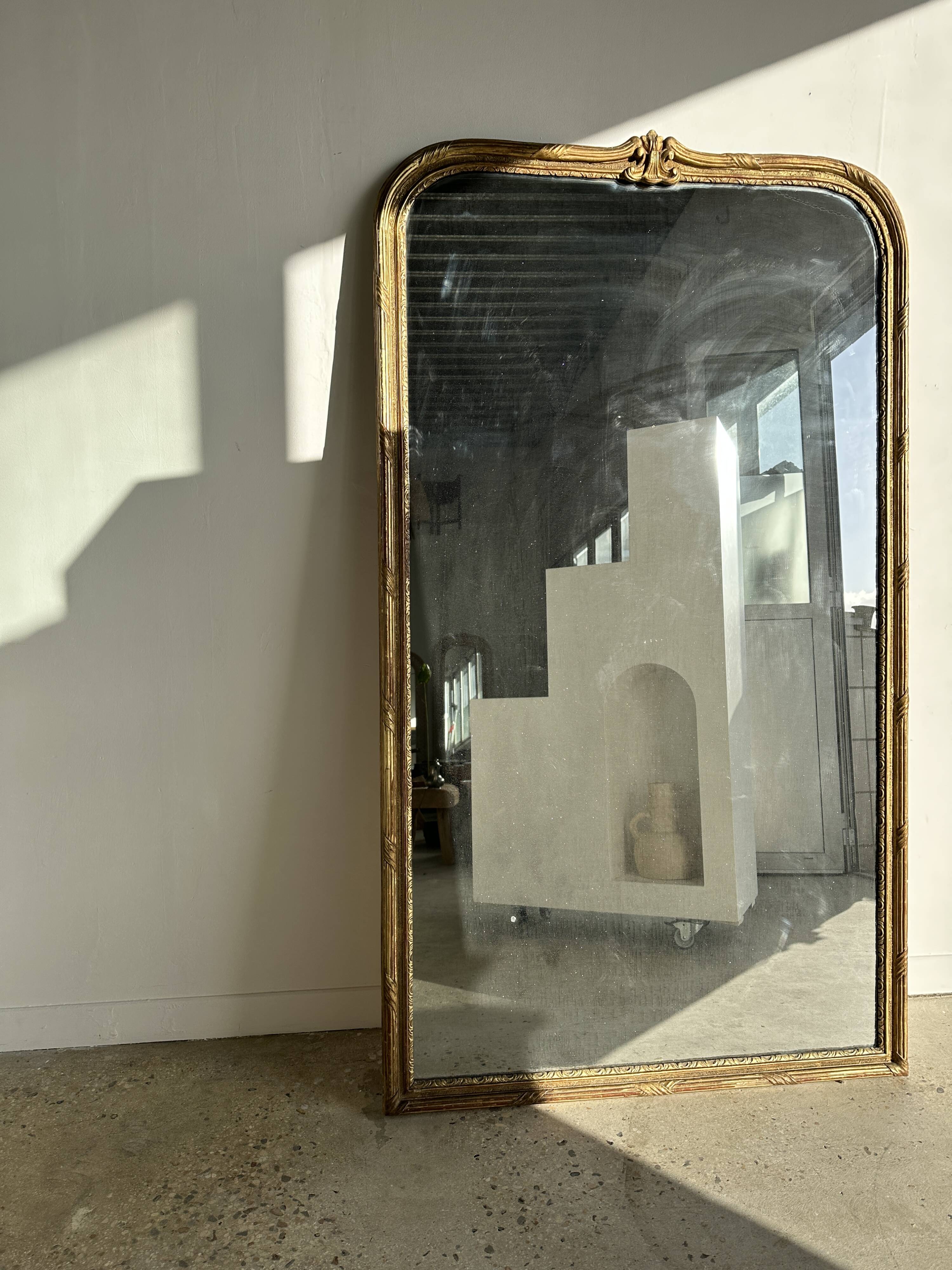 Large gilded mirror 19th century rounded corners mercury glass Louis XVI style