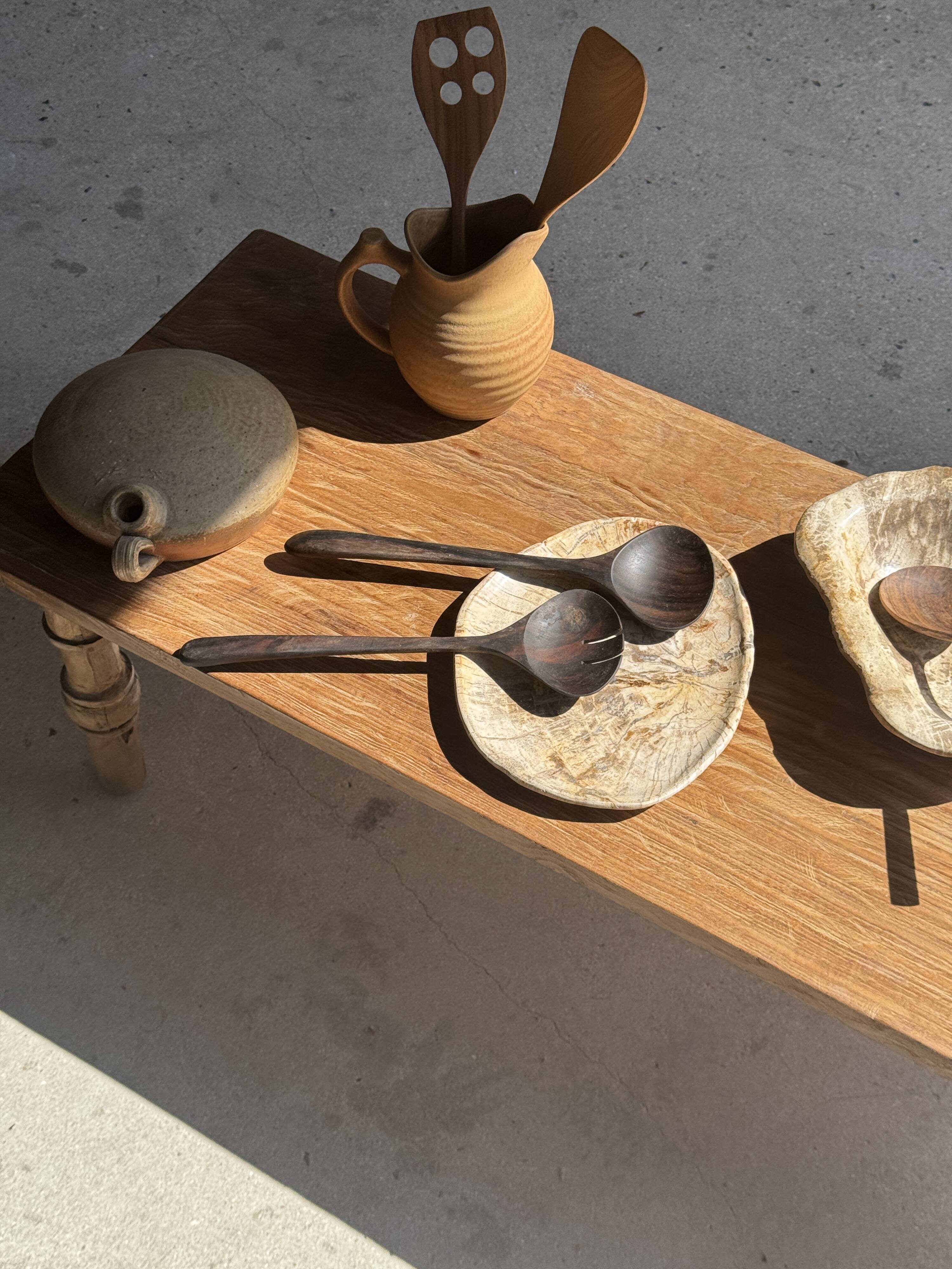 Pair of salad servers or kitchen utensils in blackened teak L30 D9