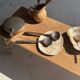 Pair of salad servers or kitchen utensils in blackened teak L30 D9