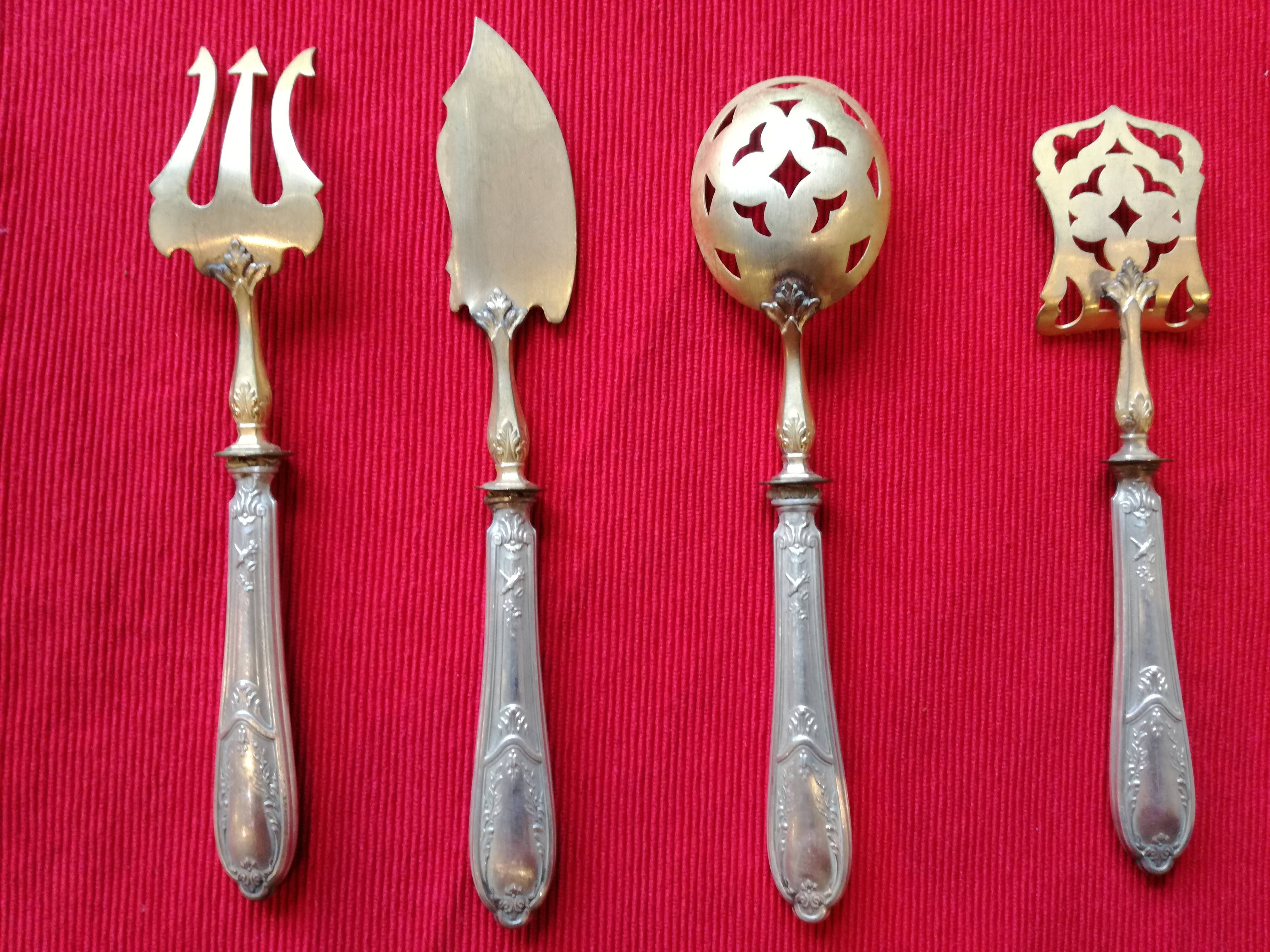 Cutlery with mignardises Late nineteenth silver and vermeil
