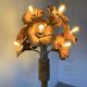 Ornamental floor lamp with "flower" patterns from the 1970s.