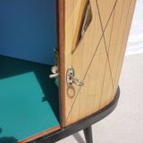 Corner chest of drawers with sliding doors