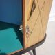 Corner chest of drawers with sliding doors