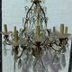 Chandelier cage with sixteen lights grapevines and crystal cups xix century