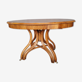 Table à allonges  avec piétement en bois courbé d'époque de la fin du 19ème siècle