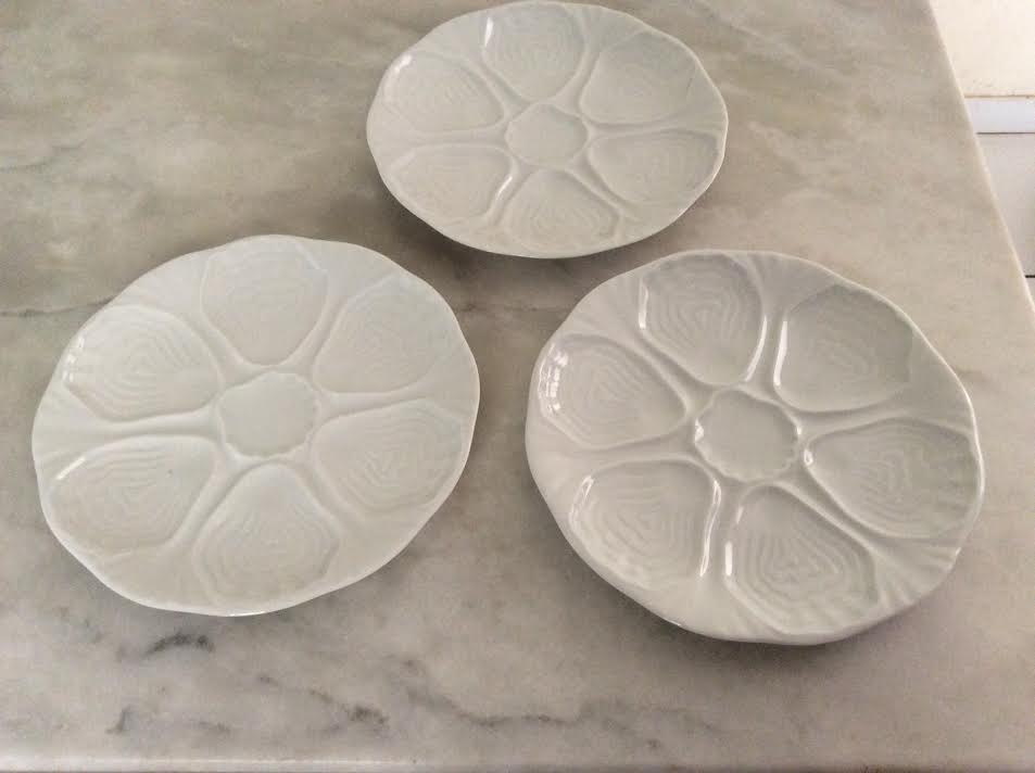 3 white porcelain plates