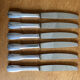 6 silver metal knives
