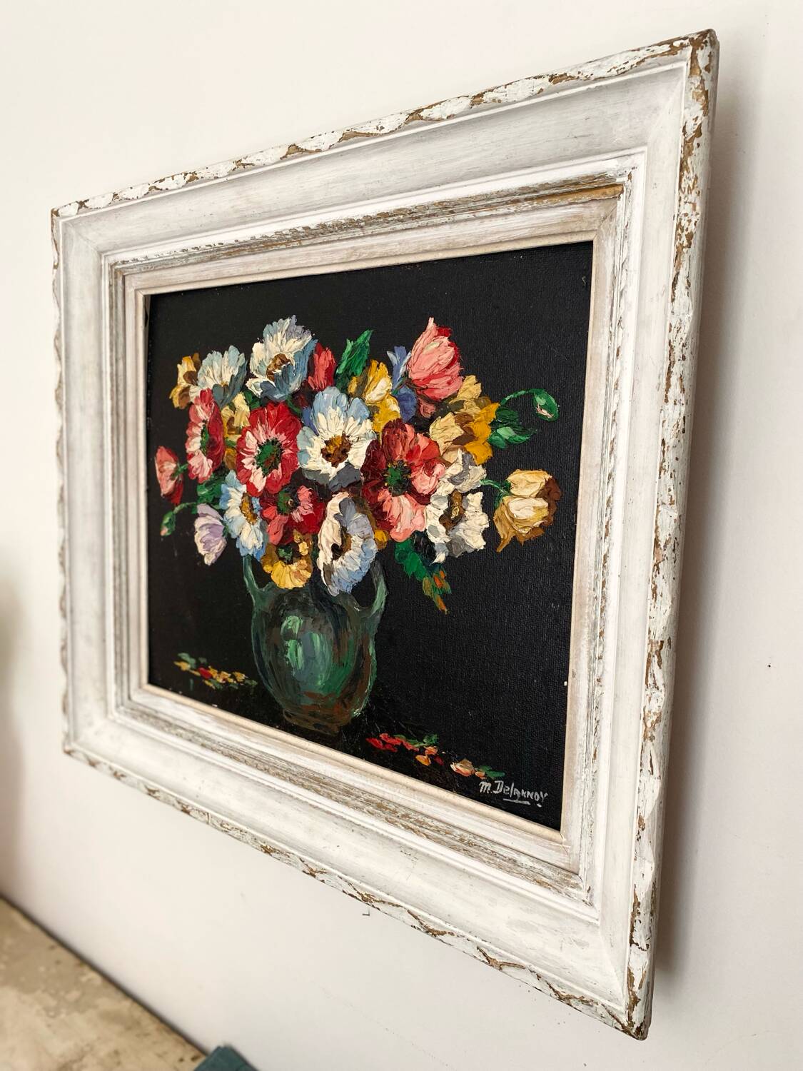 Old oil on canvas depicting a bouquet of flowers