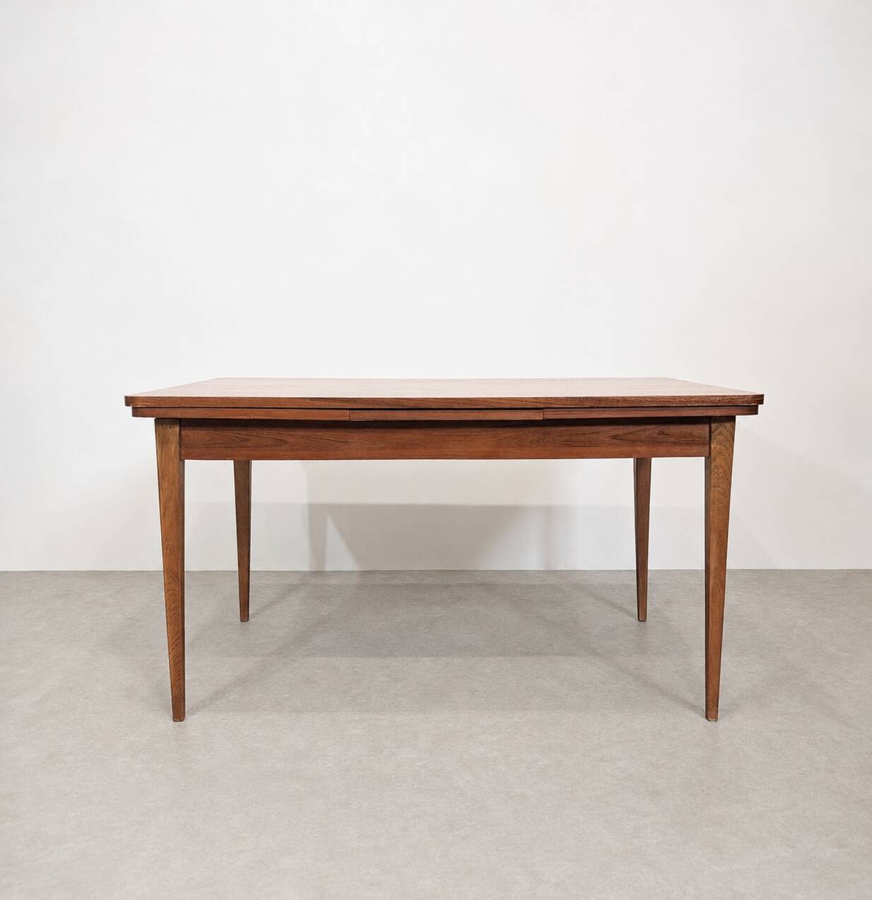 Scandinavian extendable dining table in teak, circa 1960.