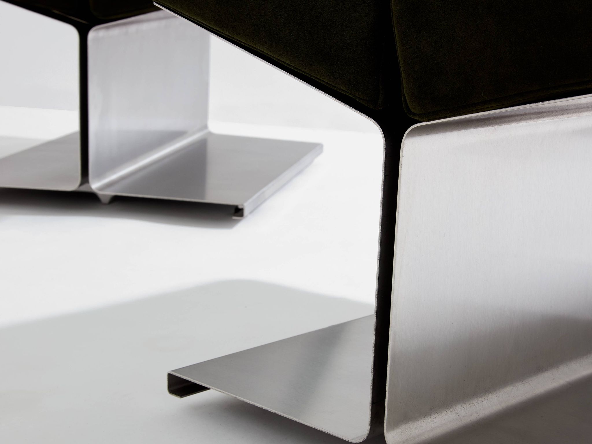 Pair of ottomans by Paul Geoffroy, brushed steel and alcantara, 1975