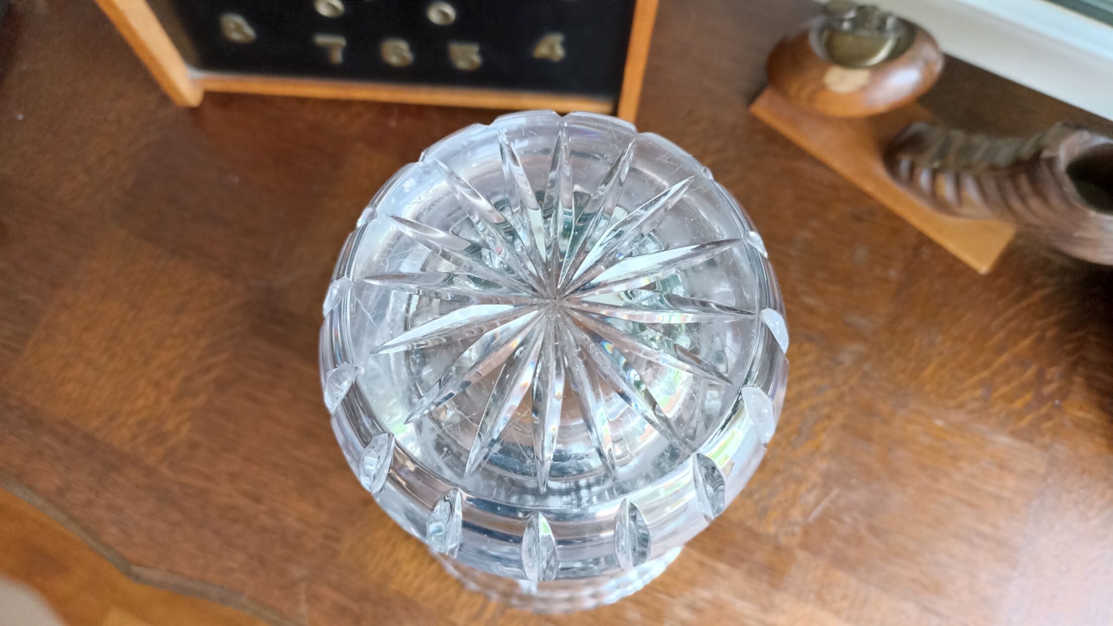 Carved solid crystal vase, floral decoration