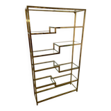 Old shelf in golden metal brass geometric library design 80s vintage