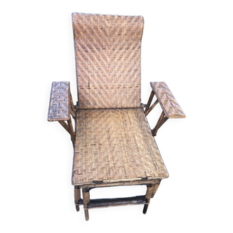 Antique rattan and wicker lounge chair