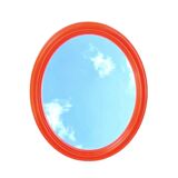 Vintage orange plastic oval wall mirror