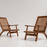 pair of french mahogany and cane armchairs, 1950s