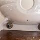 Wall-mounted washbasin shell-shaped, enamelled earthenware by Maurice Herb.
