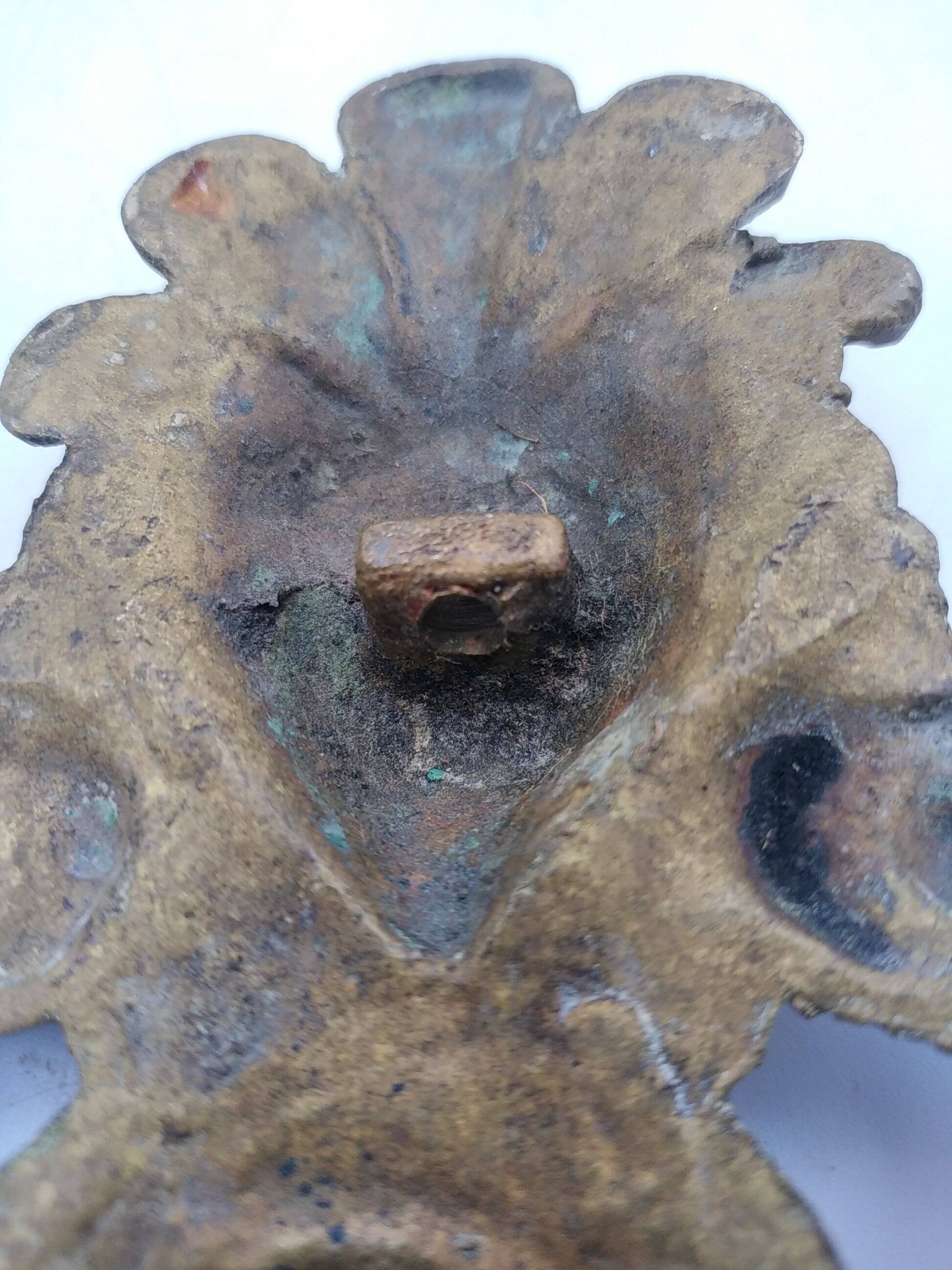 Brass lion head. Furniture decoration, leftover knocker or large nail cover?