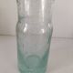 Vintage vase in very pale green bubbled glass, handcrafted