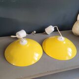 Pair of yellow lacquered metal pendant lights