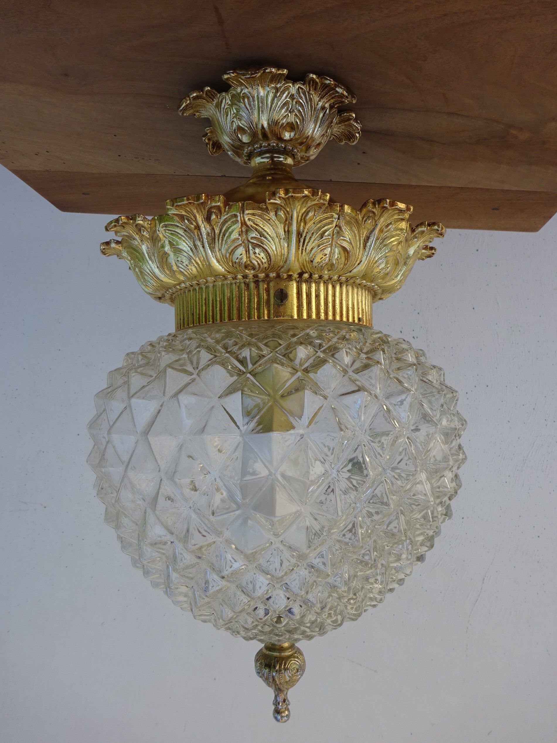 Glass and brass globe chandelier