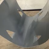 Designer log holder in enameled sheet metal