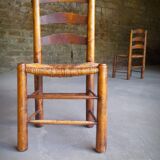 Set of 4 straw-covered brutalist chairs by George Robert